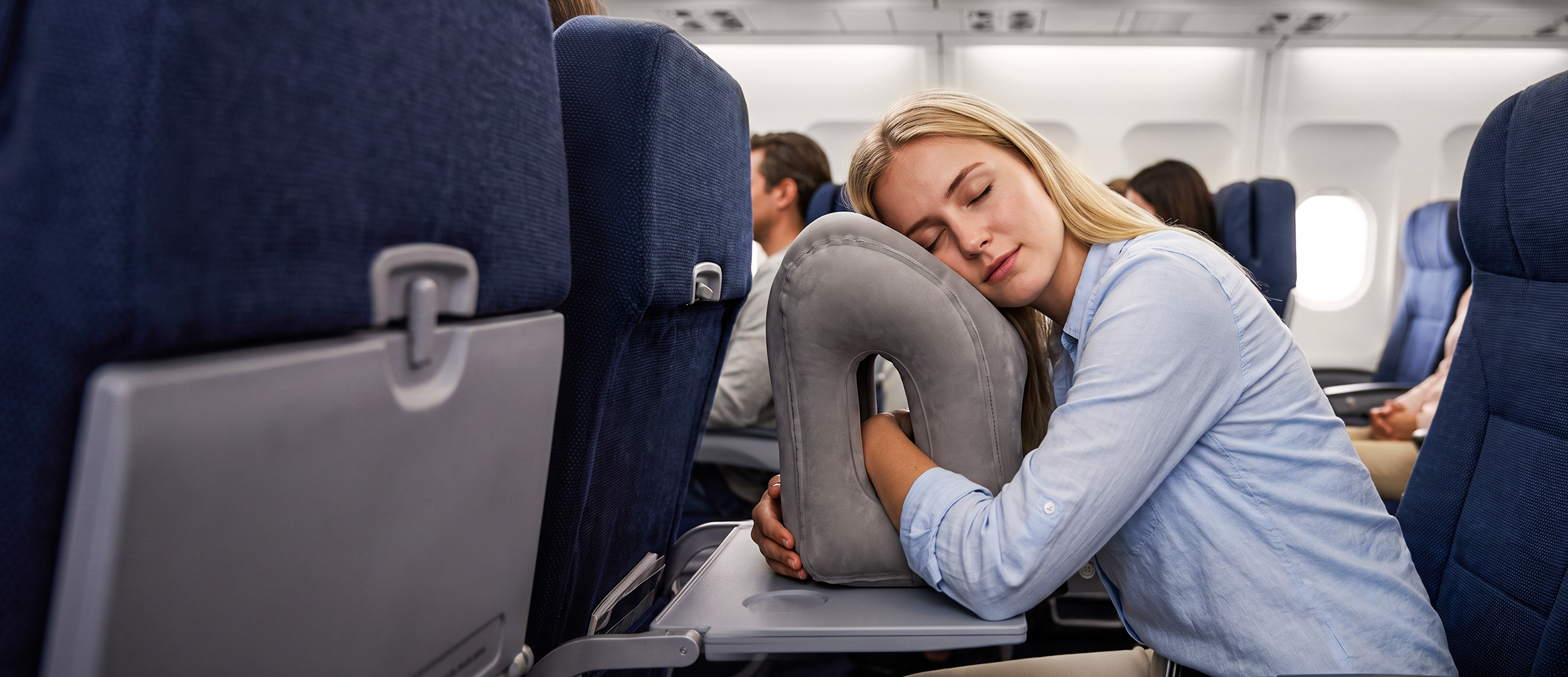 Inflatable travel pillow on an airplane